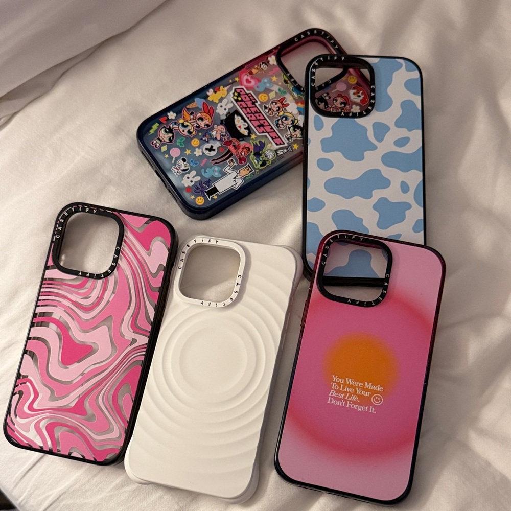Vibrant Phone Case Collection with Pink, Blue, and White Designs